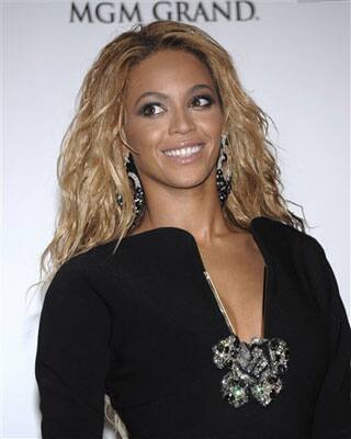 Singer Beyonce Knowles poses in the press room at the 2011 Billboard Music Awards.