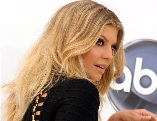 Singer Fergie arrives at the 2011 Billboard Music Awards.