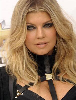 Singer Fergie arrives at the 2011 Billboard Music Awards.