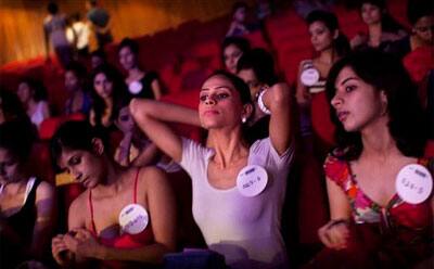 Indian models wait their turn to walk in front of the judges while taking part in the Ford Models Supermodel of the World competition in New Delhi. 