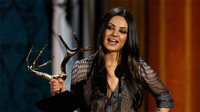 Mila Kunis accepts the holy grail of hot award at the Spike TV Guys Choice Awards.