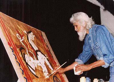 MF Husain lending colours to his painting.