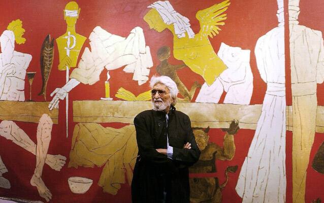 MF Husain with one of his paintings.