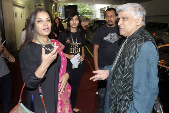 Bollywood lyricist Javed Akhtar and his wife, actress Shabana Azmi, stand in front of a hotel in Toronto. The International Indian Film Academy (IIFA) Awards will be held in Toronto on June 25.