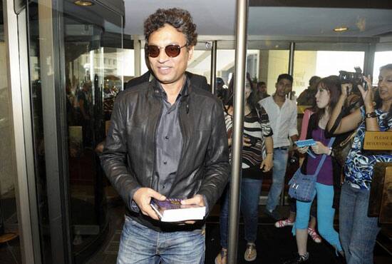 Bollywood actor Irrfan Khan walks into a hotel in Toronto. The International Indian Film Academy (IIFA) Awards will be held in Toronto on June 25.