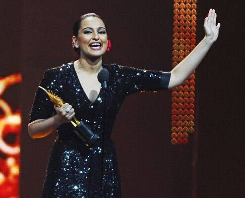 Actress Sonakshi Sinha reacts after receiving Best Debut Actress award during 2011 International Indian Film Academy (IIFA) awards at the Rogers Centre in Toronto.