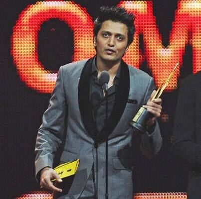 Actor Ritesh Deshmukh reacts receiving Best Performance in Comic Role award during 2011 International Indian Film Academy (IIFA) awards.