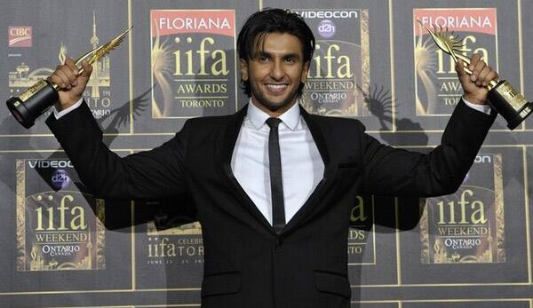 Bollywood actor Ranveer Singh poses with his awards for Best Romantic Couple with Anushka Sharma and Best Debut Actor during the International Indian Film Academy (IIFA) Awards.