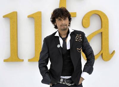 Sonu Nigam poses for a pic at the IIFA.