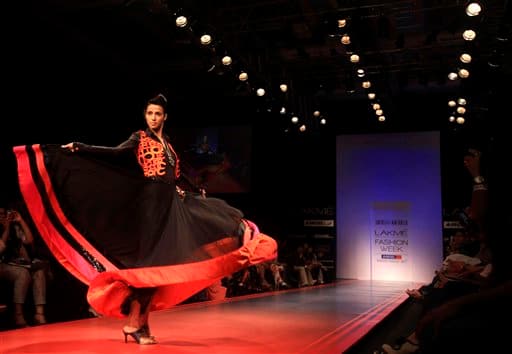 An Indian model displays a creation by designer Archana Kochhar during Lakme Fashion Week in Mumbai.