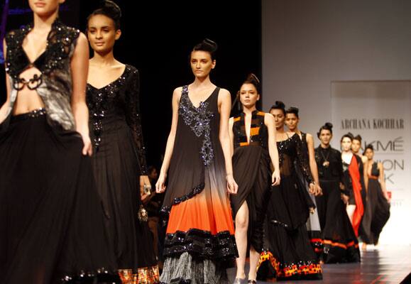 Indian models display creations by designer Archana Kochhar during the Lakme Fashion Week in Mumbai.