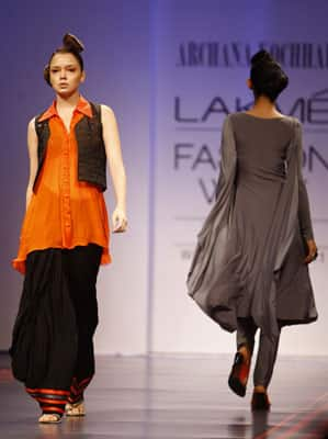 Indian models display creations by designer Archana Kochhar during the Lakme Fashion Week in Mumbai.