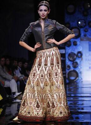 An Indian model displays designer J.J. Vallaya creations during the Lakme Fashion Week in Mumbai.