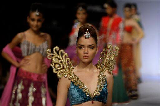 Indian models display designer Parvesh Jai creations during the Lakme Fashion Week in Mumbai.