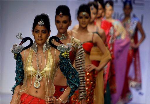 Indian models display designer Parvesh Jai creations during the Lakme Fashion Week in Mumbai.