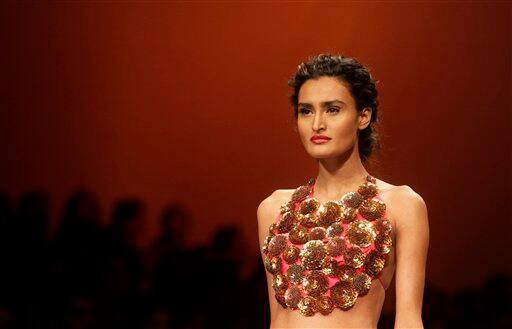 An Indian model displays designer Nachiket Barve creations during the Lakme Fashion Week in Mumbai.