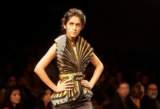 An Indian model displays designer Swapnil Shinde creations during the Lakme Fashion Week in Mumbai.