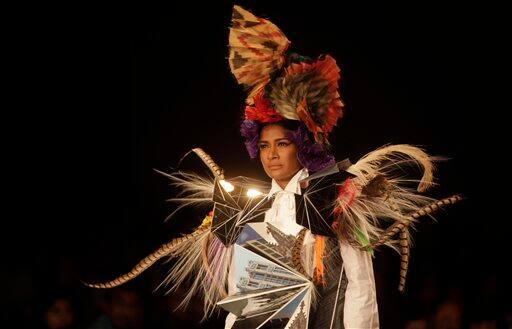 An Indian model displays designer Little Shilpa creations during the Lakme Fashion Week in Mumbai.