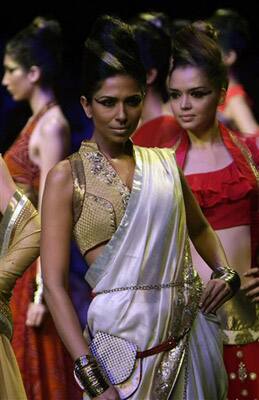 Indian models display designer Anita Dongre creations during the Lakme Fashion Week in Mumbai.