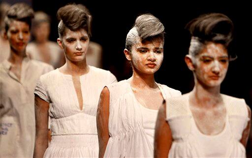 Indian models display creations by designer Rehane during the Lakme Fashion Week in Mumbai.