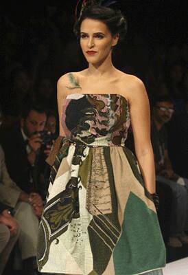 Neha Dhupia walked the ramp for Pam and Arch Tondon.