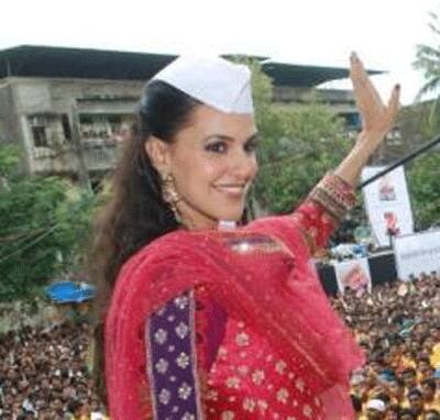 Neha Dhupia sports a Gandhi topi at Pratap Sarnaik's Dahi Handi celebrations.