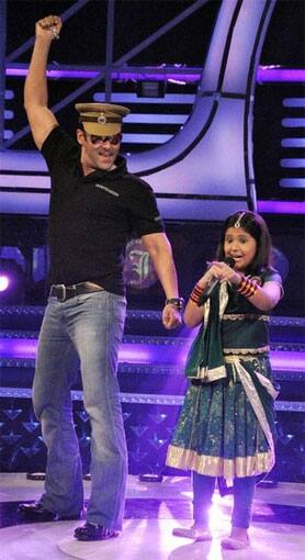 Indian Bollywood actor Salman Khan performs on set of Indian television programme 'Sa Re Ga Ma Pa Little Champs' for the promotion of his upcoming Hindi film 'Bodyguard'.