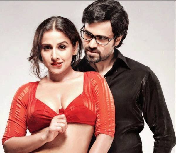 Vidya Balan looks sensuous as Emraan Hashmi looks on in a still from `The Dity Picture`. 