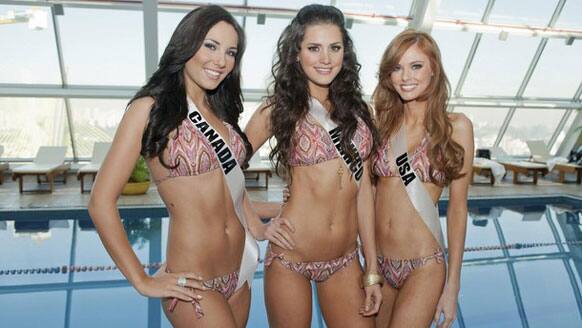 Miss Universe Canada 2011, Chelsae Durocher; Miss Universe Mexico 2011, Karin Ontiveros; and Miss USA 2011, Alyssa Campanella; pose in her Catalina Brasil swimwear at the Hilton Sao Paulo.