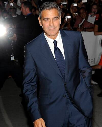 George Clooney attends a gala screening of 