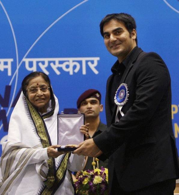 Arbaaz Khan receives National Award for the best popular film providing wholesome entertainment from the President of India Pratibha Patil.