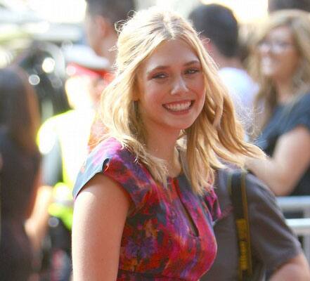 Actress Elizabeth Olsen attends the 'Martha Marcy May Marlene' premiere at Ryerson Theatre during the 2011 Toronto International Film Festival.