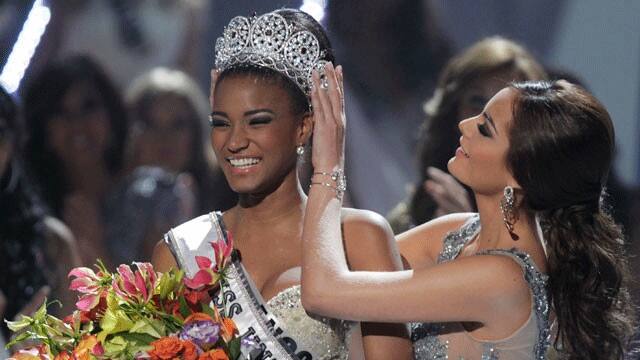 Miss Angola Leila Lopes, left, is crowned Miss Universe 2011 by Miss Universe 2010 Ximena Navarrete, of Mexico, in Sao Paulo, Brazil, Monday Sept. 12, 2011.