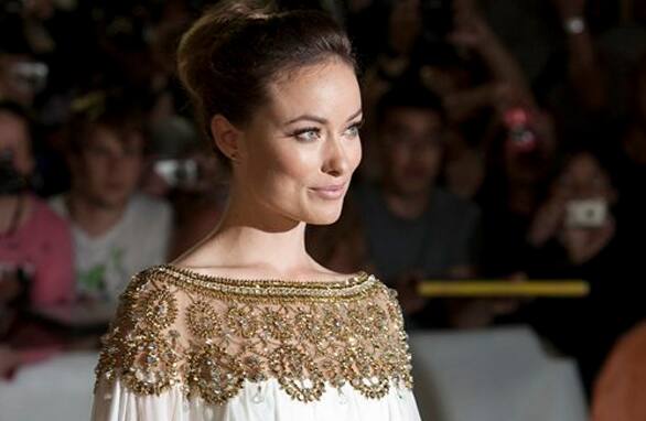 Olivia Wilde poses at the gala for the film 'Butter' during the Toronto International Film Festival in Toronto.