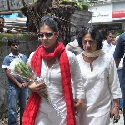 Kajol and her mother Tanuja arrive for photographer Gautam Rajadhyaksha's funeral in Mumbai. 