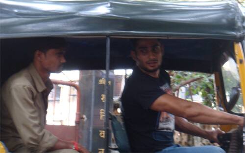 Pratiek Babbar driving an auto rikshaw in Mumbai. 