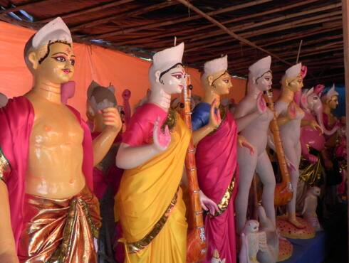 Idols lined up at an artisan's workshop in New Delhi.