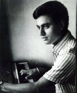 Young Jagjit plays a harmonium.