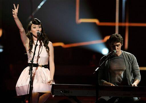 Amy Heidemann, left, and Nick Noonan of the band Karmin perform during the iHeartRadio music festival.