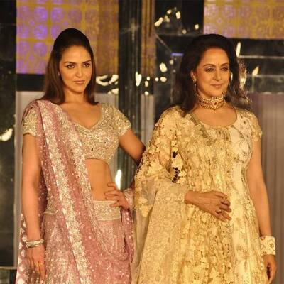 Mother-daughter duo Hema Malini and Esha Deol walked the ramp for Neeta Lulla at the Amby Valley Bridal Week in Mumbai.