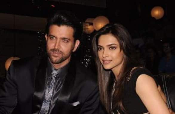 Hrithik Roshan and Deepika Padukone pose for the shutterbugs on the sets of 'Just Dance'.