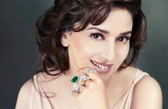 Madhuri Dixit looks splendid in a jewelery advertisement.