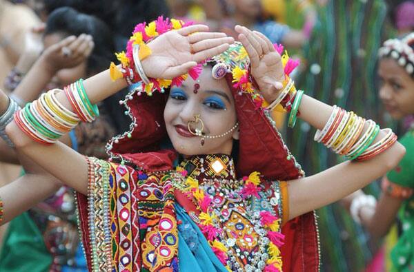 An Indian student participates in a traditional dance during the Navratri festival in Ahmedabad.