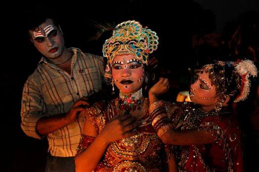 Indians dressed as Gods and Goddesses participate in a religious procession during Dussehra festival in Allahabad.