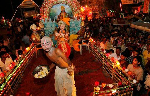 Young Indian artists dressed as Hindu Gods and Goddesses participate in a Dussehra procession in Allahabad.