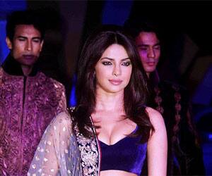 Voluptuous Priyanka Chopra sashays on the ramp at a fashion event.