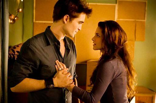 This image released by Summit Entertainment, Kristen Stewart and Robert Pattinson are shown in a scene from `The Twilight Saga: Breaking Dawn Part 1.`