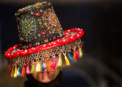 A model parades during a fashion show introducing the 