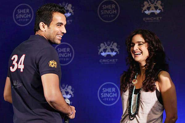 Zaheer Khan with actress Sushma Reddy at the launch of a new range of T-shirts in New Delhi. 