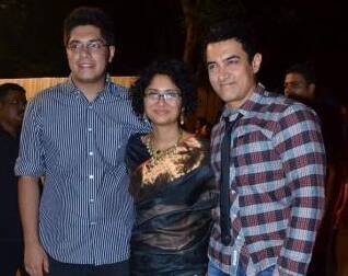 Aamir Khan and wife spotted at a party in B-town.